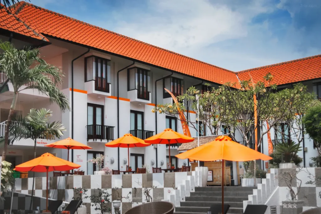 The parking facilities at Harris Hotel Kuta Tuban, indicating the availability of complimentary parking for hotel visitors. The hotel's branding might be visible.