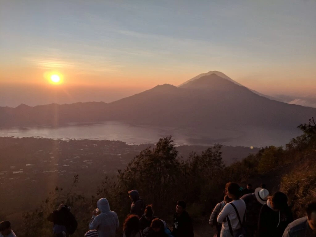 The physical difficulty Mount Batur hike is generally considered moderate. The trek usually takes about 1.5 to 2 hours to reach the summit, depending on your fitness level and the pace of your group. The path is well-worn but can be steep and rocky in places. Don’t worry, a good Mount Batur guide will adjust the pace to suit everyone in the group.