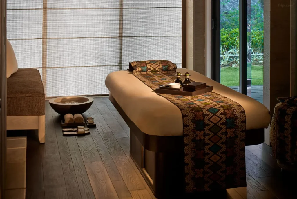 The Ritz-Carlton, Bali is a hallmark of luxury spa Bali hotels, featuring its elegant spa entrance and water features.